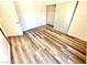Nicely designed bedroom with wood-look flooring and ample closet space at 5250 S Rainbow Blvd # 2029, Las Vegas, NV 89118