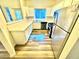 Well-lit kitchen features stainless steel appliances and breakfast bar at 5250 S Rainbow Blvd # 2029, Las Vegas, NV 89118