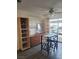Bright dining area featuring a modern table set, wooden drawers, and ample natural light at 5335 Rod Ct # 102, Las Vegas, NV 89122
