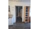 Hallway features updated flooring and an open doorway to a closet or room at 5335 Rod Ct # 102, Las Vegas, NV 89122