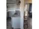 Bright kitchen with granite countertops, gray cabinets, and stainless steel sink at 5335 Rod Ct # 102, Las Vegas, NV 89122