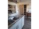 The kitchen sink area is finished with granite countertops and stainless steel appliances at 5335 Rod Ct # 102, Las Vegas, NV 89122