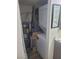 This laundry room features a stackable washer and dryer unit, and water heater at 5335 Rod Ct # 102, Las Vegas, NV 89122