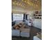 Inviting living room with a comfortable sectional sofa, stylish decor, and an abundance of natural light at 5335 Rod Ct # 102, Las Vegas, NV 89122