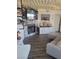 A living room featuring a fireplace, TV, and a cozy seating area with throw pillows at 5335 Rod Ct # 102, Las Vegas, NV 89122