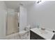 Bathroom with white vanity, tile floors, a walk-in shower and a toilet at 5341 Cool Dawn Ct, Las Vegas, NV 89130