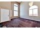 Bright, high-ceiling foyer featuring large arched windows and a chandelier at 5341 Cool Dawn Ct, Las Vegas, NV 89130