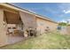 Sprawling back yard with outdoor dining and storage areas, great for entertaining at 603 Palmhurst Dr, Las Vegas, NV 89145