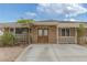 Charming home featuring decorative trim, a covered entrance, and mature landscaping at 603 Palmhurst Dr, Las Vegas, NV 89145