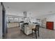 Updated kitchen with a granite island, stainless steel appliances, and ample countertop space for cooking and entertaining at 603 Palmhurst Dr, Las Vegas, NV 89145