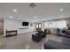 Bright living room with hardwood floors, recessed lighting, and access to outdoor area at 603 Palmhurst Dr, Las Vegas, NV 89145