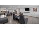 Open concept living space combining the kitchen, dining area, and living room at 603 Palmhurst Dr, Las Vegas, NV 89145