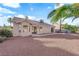Backyard view showcasing the splash pool, rock landscaping, and lush greenery for a tranquil outdoor space at 6231 Curlew Dr, Las Vegas, NV 89122