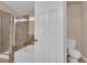 Bathroom showcasing a tiled shower, tub, and toilet at 6231 Curlew Dr, Las Vegas, NV 89122
