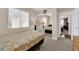 Comfortable bedroom featuring mirrored closet doors and neutral carpet at 6231 Curlew Dr, Las Vegas, NV 89122