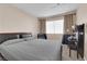 Calm bedroom with a desk and a window for natural light at 6231 Curlew Dr, Las Vegas, NV 89122