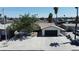Aerial view of a single Gathering home with a spacious driveway and well maintained landscaping at 6305 Fairwood Ave, Las Vegas, NV 89107