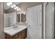 Contemporary bathroom with a large mirror, modern lighting, and a walk-in shower, providing a spa-like experience at 6423 Grayback Dr, North Las Vegas, NV 89084