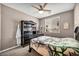 Inviting bedroom with a soft color palette, a comfortable bed, and stylish furnishings, perfect for restful nights at 6423 Grayback Dr, North Las Vegas, NV 89084