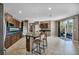 Spacious kitchen featuring a central island, stainless steel appliances and lots of counter space at 6423 Grayback Dr, North Las Vegas, NV 89084