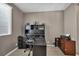 Functional home office with neutral tones and a comfortable workspace at 6423 Grayback Dr, North Las Vegas, NV 89084
