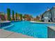 A refreshing backyard pool offers a relaxing escape on a sunny day at 6423 Grayback Dr, North Las Vegas, NV 89084