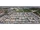 Expansive aerial view of a Primary-planned community featuring numerous homes and streets at 7072 Arabian Ridge St, Las Vegas, NV 89131