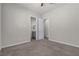 Spacious bedroom with a ceiling fan and a view into the bathroom at 7072 Arabian Ridge St, Las Vegas, NV 89131