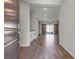 Inviting entryway with wood-look tile flooring, recessed lighting, and a view into the living space at 7072 Arabian Ridge St, Las Vegas, NV 89131