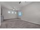Spacious main bedroom featuring a ceiling fan and wet bar at 7072 Arabian Ridge St, Las Vegas, NV 89131