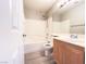 Bathroom featuring a tub, toilet, and vanity at 7371 Catmint St, Las Vegas, NV 89113