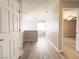 Upstairs hallway with hard surface floors that leads to the bedroom at 7371 Catmint St, Las Vegas, NV 89113