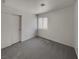 Spare bedroom with carpet, closet, and window at 7900 Wood Shadow Ct, Las Vegas, NV 89131