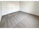 Empty bedroom featuring neutral carpet and a double door closet at 7900 Wood Shadow Ct, Las Vegas, NV 89131