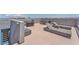 Spacious rooftop deck is ideal for outdoor entertaining and features comfortable seating and panoramic views at 8076 Haywood Estate Ave, Las Vegas, NV 89113