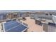Relax on the roof top deck that includes outdoor furniture and sweeping city and mountain views at 8076 Haywood Estate Ave, Las Vegas, NV 89113