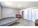 Spacious bedroom with neutral walls, a bed frame, and a crib at 844 Balzar Ave, Las Vegas, NV 89106