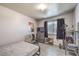 Bedroom featuring a full bed, media dresser and black out curtains at 844 Balzar Ave, Las Vegas, NV 89106