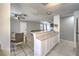Open kitchen view with breakfast bar connecting to the dining and living areas at 844 Balzar Ave, Las Vegas, NV 89106