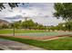 Outdoor community basketball court with green playing surface and mountain views at 9417 Grenville Ave, Las Vegas, NV 89134