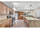 Spacious kitchen with granite countertops, stainless steel appliances, and ample cabinet space at 9417 Grenville Ave, Las Vegas, NV 89134