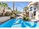 Relaxing pool area with lush tropical landscaping and hot tub at 9417 Grenville Ave, Las Vegas, NV 89134