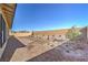 Spacious, low-maintenance backyard with desert landscaping and a privacy wall, ready for personalization at 1044 Forest Falcon Dr, Henderson, NV 89011
