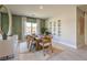 Tasteful dining room featuring modern table, stylish seating, and contemporary decor at 1044 Forest Falcon Dr, Henderson, NV 89011