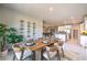 Inviting dining space with modern furnishings, open to kitchen and living areas at 1044 Forest Falcon Dr, Henderson, NV 89011