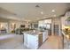Open-concept kitchen with stainless steel appliances, ample storage, and seamless flow to living spaces at 1044 Forest Falcon Dr, Henderson, NV 89011