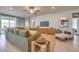 Cozy living room with tile flooring and contemporary furnishings, showcasing the design at 1044 Forest Falcon Dr, Henderson, NV 89011