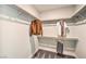 This walk-in closet features neutral walls, carpeted floor, and shelving at 1044 Forest Falcon Dr, Henderson, NV 89011