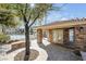 Community pool and clubhouse featuring well-maintained landscaping and a tiled roof at 1832 N Decatur Blvd # 104, Las Vegas, NV 89108