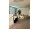 Bedroom area with carpet and a play area at 1885 Vass Springs Pl, North Las Vegas, NV 89084